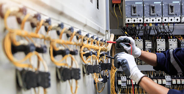 Professional Electrician technician working in Oxford, AL
